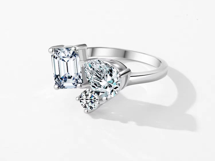 Toi et Moi – Emerald And Pear Shape Lab-Grown Diamond CZ Engagement Ring in Sterling Silver